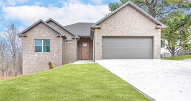 Brand-new construction 3-bedroom, 2-bath home located in the on Bella Vista Country Club - Scottsdale in Arkansas - for sale on GolfHomes.com, golf home, golf lot