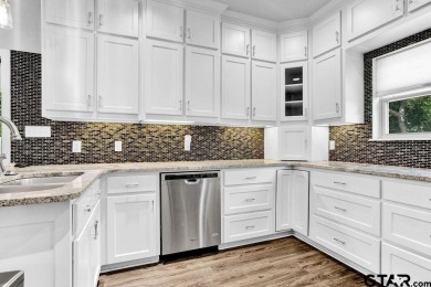 Enjoy resort style living in this beautiful 3-bedroom, 2.5-bath on Hide-A-Way Lake Golf Course in Texas - for sale on GolfHomes.com, golf home, golf lot