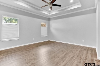 Enjoy resort style living in this beautiful 3-bedroom, 2.5-bath on Hide-A-Way Lake Golf Course in Texas - for sale on GolfHomes.com, golf home, golf lot