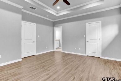Enjoy resort style living in this beautiful 3-bedroom, 2.5-bath on Hide-A-Way Lake Golf Course in Texas - for sale on GolfHomes.com, golf home, golf lot