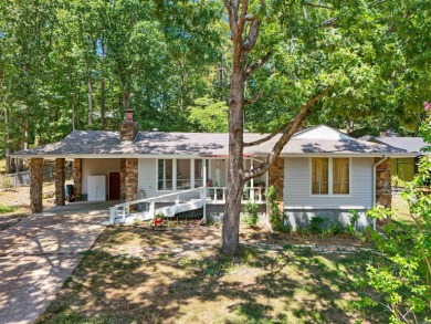 Are you in search of the perfect summer home or a welcoming on Indian Hills Country Club in Arkansas - for sale on GolfHomes.com, golf home, golf lot