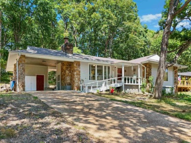 Are you in search of the perfect summer home or a welcoming on Indian Hills Country Club in Arkansas - for sale on GolfHomes.com, golf home, golf lot