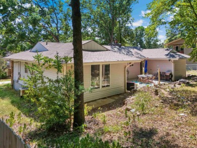 Are you in search of the perfect summer home or a welcoming on Indian Hills Country Club in Arkansas - for sale on GolfHomes.com, golf home, golf lot