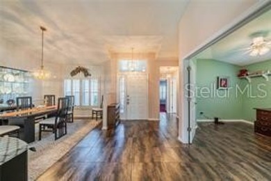 Charming St. Thomas Model with Pond & Conservation Views!  This on Caloosa Greens Executive Golf Course in Florida - for sale on GolfHomes.com, golf home, golf lot