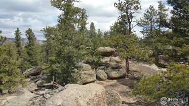 This lot gives you the peace and serenity you have been looking on Fox Acres Country Club in Colorado - for sale on GolfHomes.com, golf home, golf lot