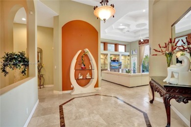 Welcome to this beautifully appointed home that blends elegance on Boca Grove Golf and Tennis in Florida - for sale on GolfHomes.com, golf home, golf lot