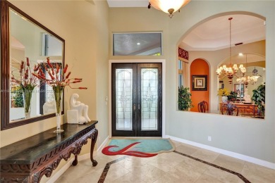 Welcome to this beautifully appointed home that blends elegance on Boca Grove Golf and Tennis in Florida - for sale on GolfHomes.com, golf home, golf lot