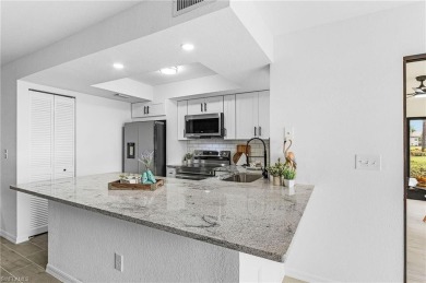 Beautifully remodeled 1st floor condo with incredible panoramic on Hideaway Country Club in Florida - for sale on GolfHomes.com, golf home, golf lot