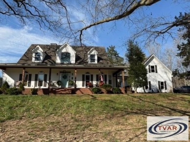 Beautiful 4-bedroom, 3.5-bath country home on 2.6 acres with on Paris Golf and Country Club in Tennessee - for sale on GolfHomes.com, golf home, golf lot