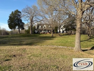 Beautiful 4-bedroom, 3.5-bath country home on 2.6 acres with on Paris Golf and Country Club in Tennessee - for sale on GolfHomes.com, golf home, golf lot