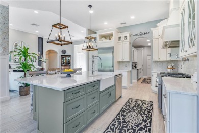 Elevated elegance meets exceptional design in this estate on The Legacy Club At Alaqua Lakes in Florida - for sale on GolfHomes.com, golf home, golf lot