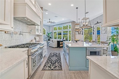 Elevated elegance meets exceptional design in this estate on The Legacy Club At Alaqua Lakes in Florida - for sale on GolfHomes.com, golf home, golf lot
