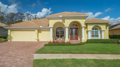 Experience unparalleled luxury in this exquisite estate on Stoneybrook Golf Club At Heritage Harbour in Florida - for sale on GolfHomes.com, golf home, golf lot