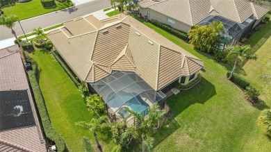 Experience unparalleled luxury in this exquisite estate on Stoneybrook Golf Club At Heritage Harbour in Florida - for sale on GolfHomes.com, golf home, golf lot