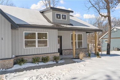 Living in Bella Vista means enjoying seven beautiful lakes on Bella Vista Country Club and Golf Course in Arkansas - for sale on GolfHomes.com, golf home, golf lot