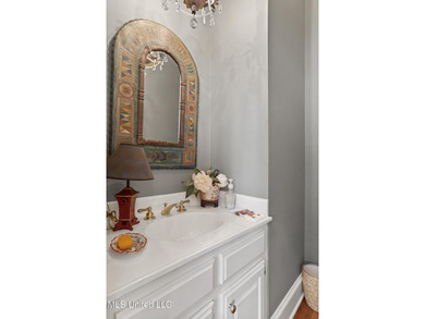 Perfectly positioned across from the golf course in the on Country Club of Jackson in Mississippi - for sale on GolfHomes.com, golf home, golf lot