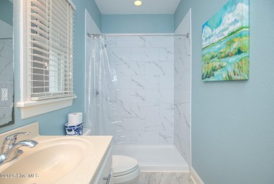 Welcome to 105 Colony Point Street - where coastal charm meets on North River Club in North Carolina - for sale on GolfHomes.com, golf home, golf lot