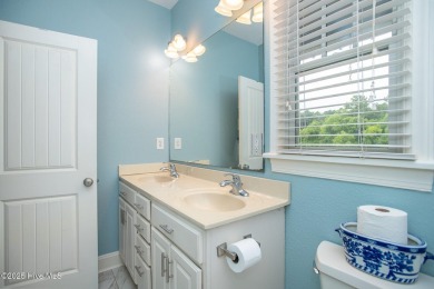 Welcome to 105 Colony Point Street - where coastal charm meets on North River Club in North Carolina - for sale on GolfHomes.com, golf home, golf lot