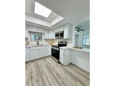 Discover this beautifully remodeled 2nd Floor, 2-bedroom on Country Club At Silver Springs Shores in Florida - for sale on GolfHomes.com, golf home, golf lot