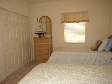 MOTIVATED SELLER!  This immaculate 2 bedroom, 2 1/2 bath on Deep Creek Golf Club in Florida - for sale on GolfHomes.com, golf home, golf lot