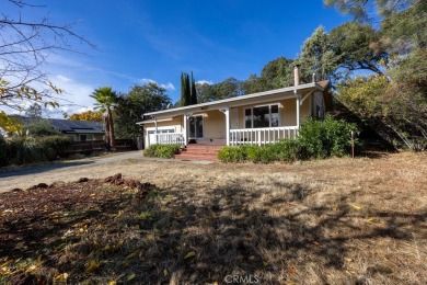 Nestled on a peaceful street, this charming 2-bedroom, 1.5-bath on Hidden Valley Lake Golf and Country Club in California - for sale on GolfHomes.com, golf home, golf lot
