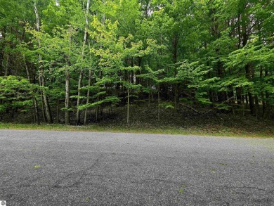 Nicely mature, wooded 1.07 acre lot in a quiet subdivision on A-Ga-Ming Golf Resort in Michigan - for sale on GolfHomes.com, golf home, golf lot