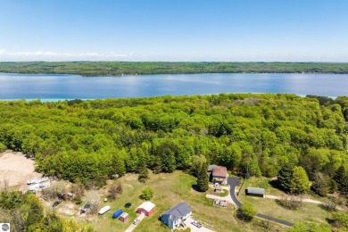 Nicely mature, wooded 1.07 acre lot in a quiet subdivision on A-Ga-Ming Golf Resort in Michigan - for sale on GolfHomes.com, golf home, golf lot