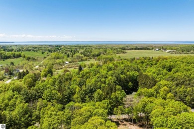 Nicely mature, wooded 1.07 acre lot in a quiet subdivision on A-Ga-Ming Golf Resort in Michigan - for sale on GolfHomes.com, golf home, golf lot