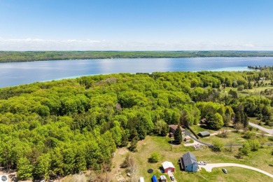 Nicely mature, wooded 1.07 acre lot in a quiet subdivision on A-Ga-Ming Golf Resort in Michigan - for sale on GolfHomes.com, golf home, golf lot