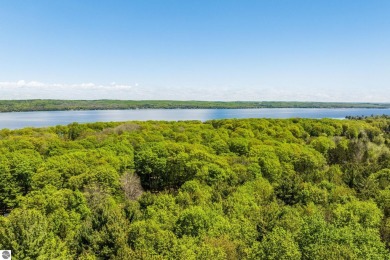 Nicely mature, wooded 1.07 acre lot in a quiet subdivision on A-Ga-Ming Golf Resort in Michigan - for sale on GolfHomes.com, golf home, golf lot