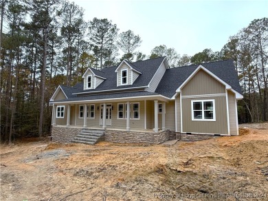 This is an exquisitely designed and beautifully constructed on Woodlake Country Club in North Carolina - for sale on GolfHomes.com, golf home, golf lot