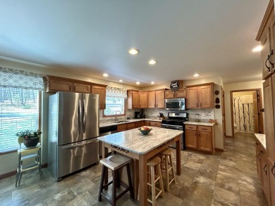 Privacy and seclusion await at this true Up North retreat! This on Forest Dunes Golf Club in Michigan - for sale on GolfHomes.com, golf home, golf lot
