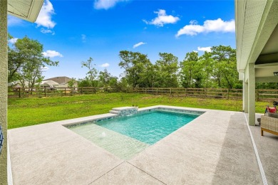 Discover this beautiful single-family remodeled home nestled in on Pine Ridge Community Golf and Country Club in Florida - for sale on GolfHomes.com, golf home, golf lot