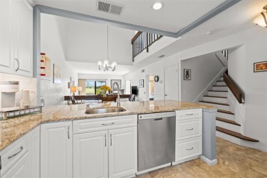 EXCEPTIONAL VALUE for this SPECTACULAR GOLF COURSE TOWNHOME IN on Isla Del Sol Yacht and Country Club in Florida - for sale on GolfHomes.com, golf home, golf lot