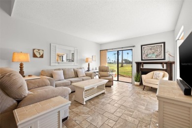 EXCEPTIONAL VALUE for this SPECTACULAR GOLF COURSE TOWNHOME IN on Isla Del Sol Yacht and Country Club in Florida - for sale on GolfHomes.com, golf home, golf lot