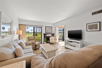 EXCEPTIONAL VALUE for this SPECTACULAR GOLF COURSE TOWNHOME IN on Isla Del Sol Yacht and Country Club in Florida - for sale on GolfHomes.com, golf home, golf lot