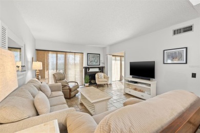 EXCEPTIONAL VALUE for this SPECTACULAR GOLF COURSE TOWNHOME IN on Isla Del Sol Yacht and Country Club in Florida - for sale on GolfHomes.com, golf home, golf lot