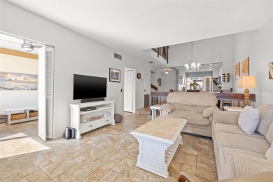 EXCEPTIONAL VALUE for this SPECTACULAR GOLF COURSE TOWNHOME IN on Isla Del Sol Yacht and Country Club in Florida - for sale on GolfHomes.com, golf home, golf lot