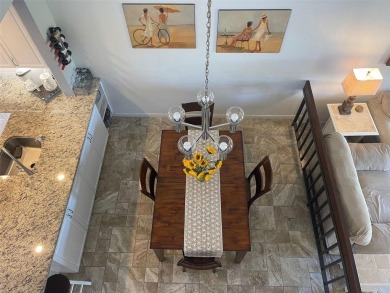 EXCEPTIONAL VALUE for this SPECTACULAR GOLF COURSE TOWNHOME IN on Isla Del Sol Yacht and Country Club in Florida - for sale on GolfHomes.com, golf home, golf lot
