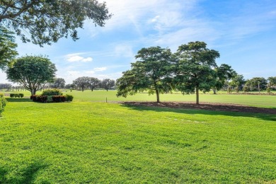 Stunning golf course views from this  completely, beautifully on Quail Ridge Golf Course and Country Club in Florida - for sale on GolfHomes.com, golf home, golf lot