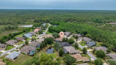 Country Club Living at Its Finest in Glen Lakes! This on Glen Lakes Country Club in Florida - for sale on GolfHomes.com, golf home, golf lot