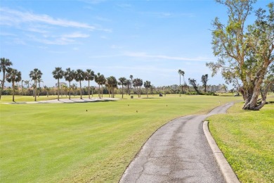 EXCEPTIONAL VALUE for this SPECTACULAR GOLF COURSE TOWNHOME IN on Isla Del Sol Yacht and Country Club in Florida - for sale on GolfHomes.com, golf home, golf lot