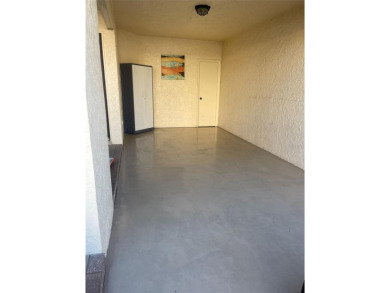 EXCEPTIONAL VALUE for this SPECTACULAR GOLF COURSE TOWNHOME IN on Isla Del Sol Yacht and Country Club in Florida - for sale on GolfHomes.com, golf home, golf lot