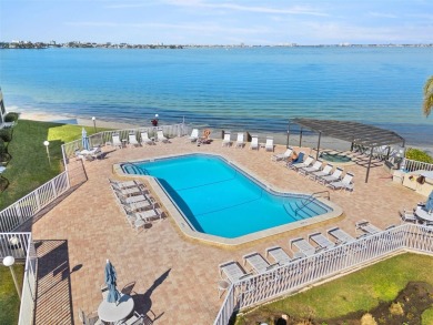EXCEPTIONAL VALUE for this SPECTACULAR GOLF COURSE TOWNHOME IN on Isla Del Sol Yacht and Country Club in Florida - for sale on GolfHomes.com, golf home, golf lot
