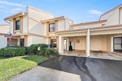 EXCEPTIONAL VALUE for this SPECTACULAR GOLF COURSE TOWNHOME IN on Isla Del Sol Yacht and Country Club in Florida - for sale on GolfHomes.com, golf home, golf lot