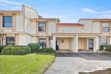 EXCEPTIONAL VALUE for this SPECTACULAR GOLF COURSE TOWNHOME IN on Isla Del Sol Yacht and Country Club in Florida - for sale on GolfHomes.com, golf home, golf lot