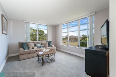 EXPERIENCE DRAMATIC WATER VIEWS FROM THIS CORNER TURNKEY UNIT! on Palm-Aire Country Club and Resort - Palms in Florida - for sale on GolfHomes.com, golf home, golf lot