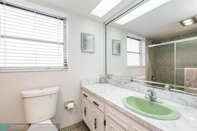 EXPERIENCE DRAMATIC WATER VIEWS FROM THIS CORNER TURNKEY UNIT! on Palm-Aire Country Club and Resort - Palms in Florida - for sale on GolfHomes.com, golf home, golf lot