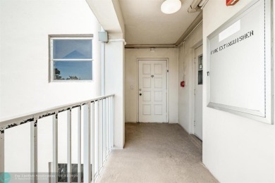 EXPERIENCE DRAMATIC WATER VIEWS FROM THIS CORNER TURNKEY UNIT! on Palm-Aire Country Club and Resort - Palms in Florida - for sale on GolfHomes.com, golf home, golf lot