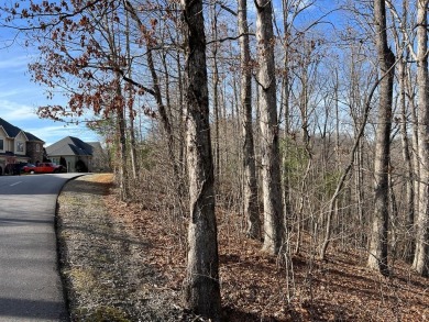 This beautifully wooded .72 acre lot is located in the gated on Chatuge Shores Golf Course in North Carolina - for sale on GolfHomes.com, golf home, golf lot